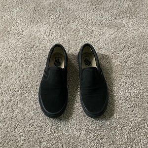 All black vans slip ons